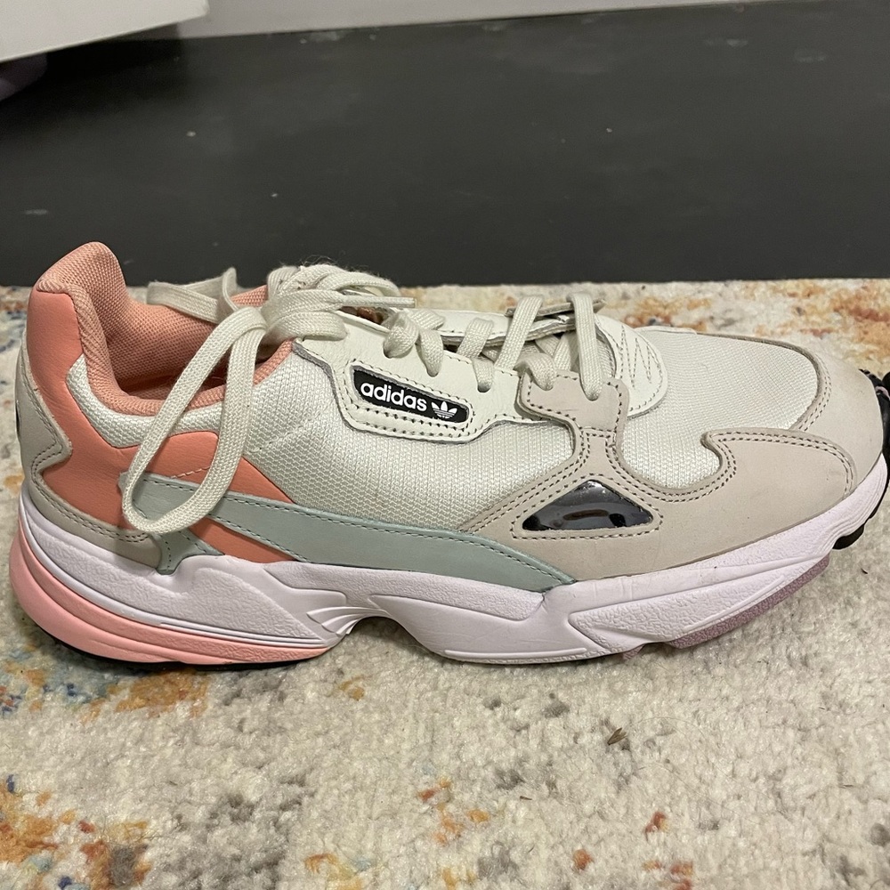 Pink and white adidas tennis shoes